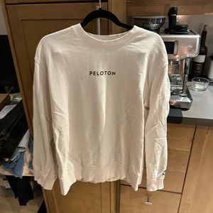 Peloton sweater. Work once. Just needs to be steamed.